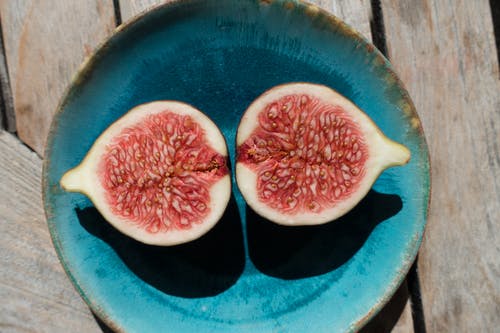 fig sliced plate wooden table